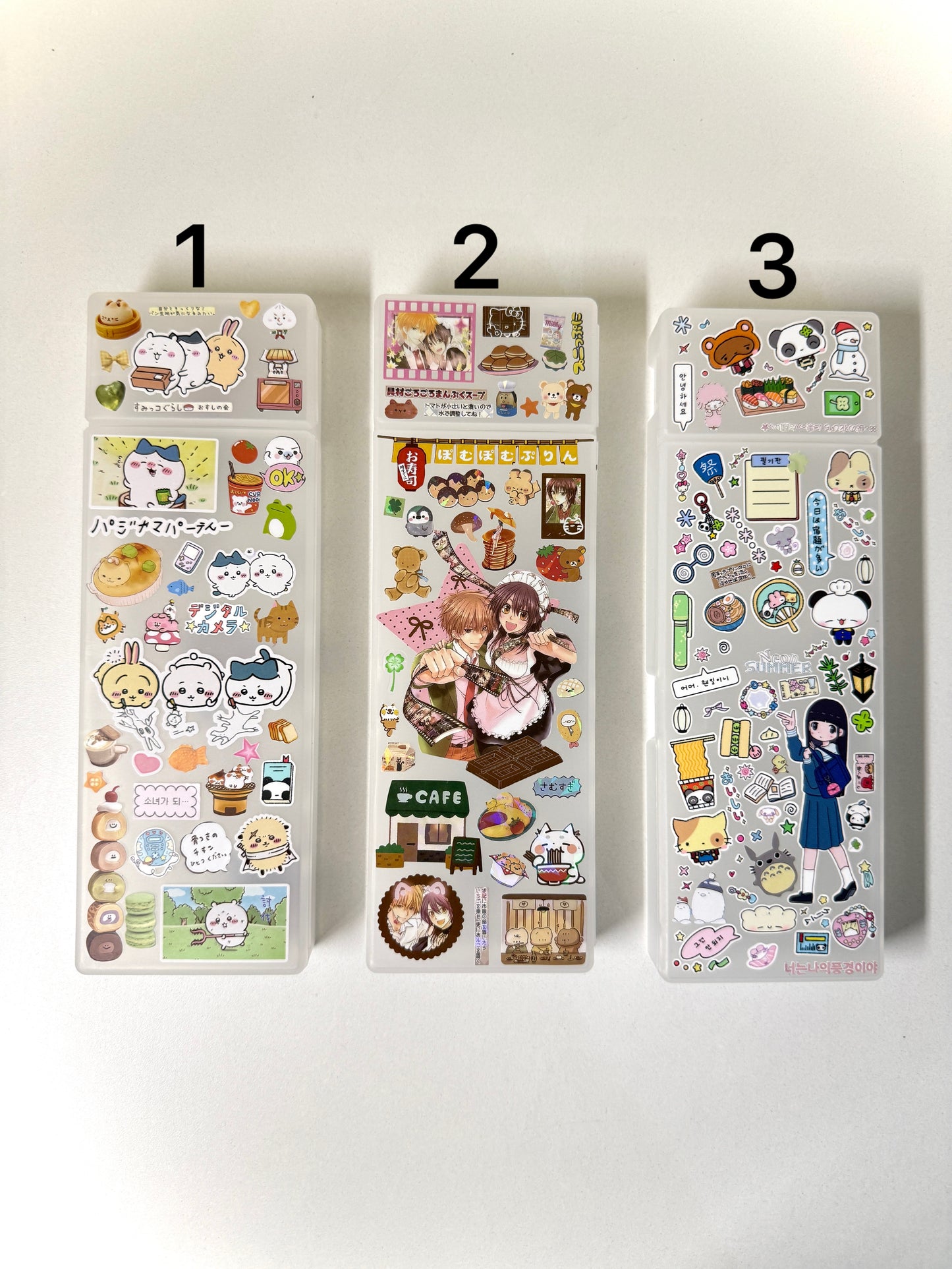 Two compartment decorated Muji pencil case