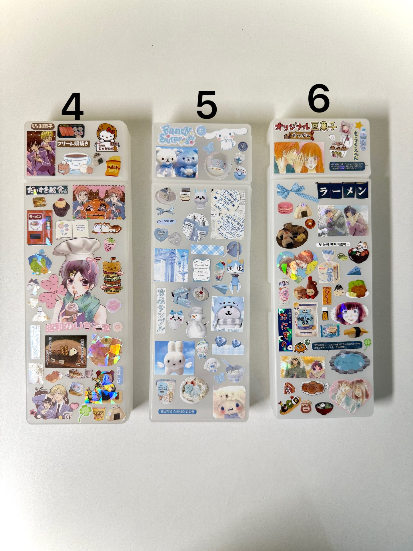Two compartment decorated Muji pencil case