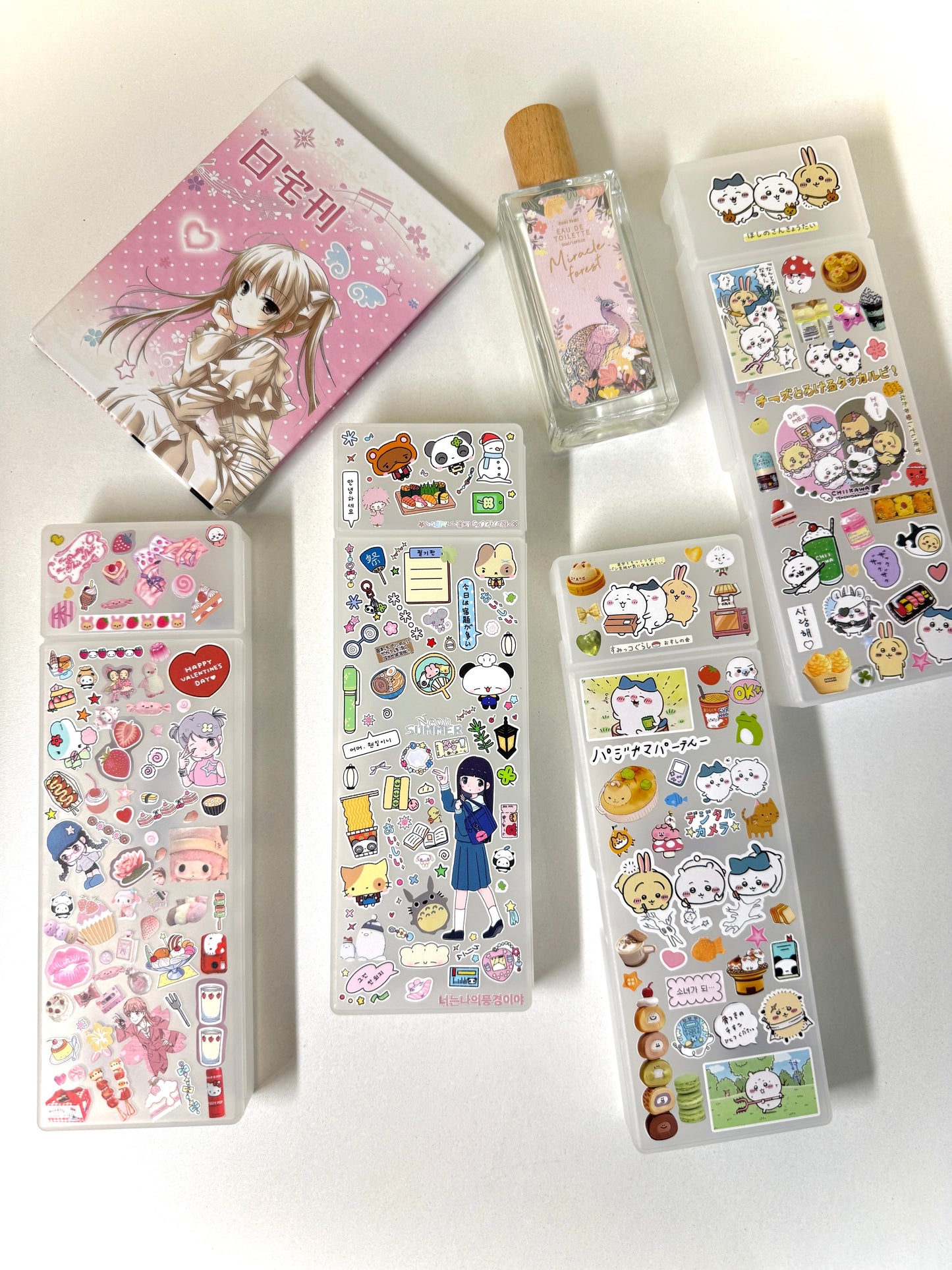 Two compartment decorated Muji pencil case